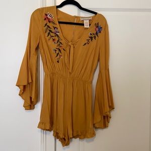mustard color boutique romper. size small